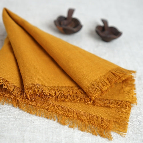 Mustard linen napkins set with tassels